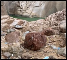 A large rock in a canyon

AI-generated content may be incorrect.