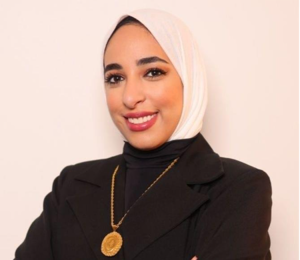 A person wearing a white head scarf

AI-generated content may be incorrect.